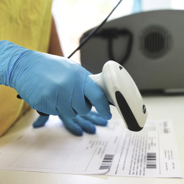 Photo of handheld digital barcode scanner.